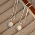 Élan Pearl Pendant Necklace